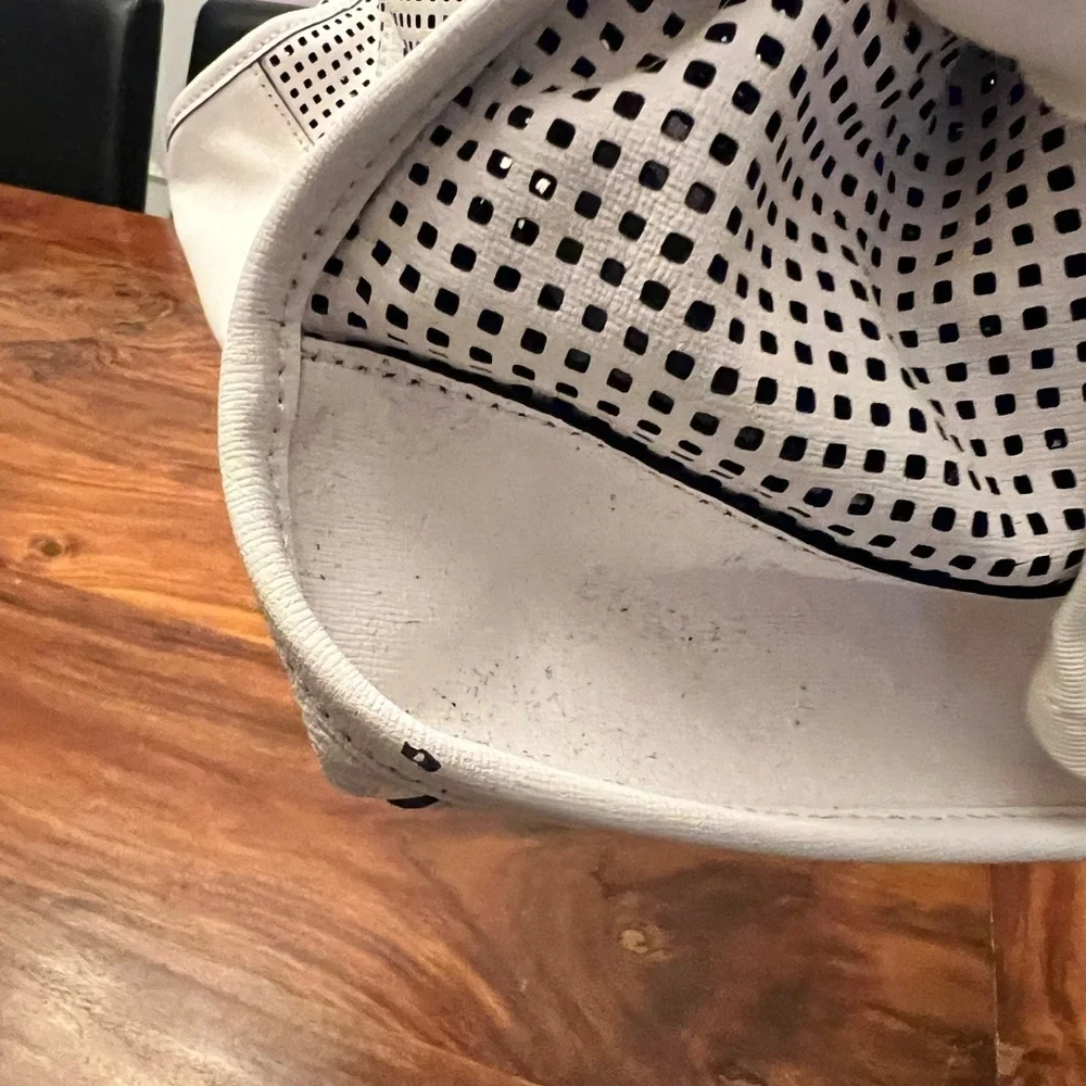 Juicy Couture White and Black Perforated Satchel